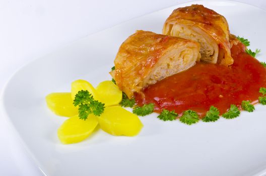 Go??bki are a form of cabbage rolls. They are a traditional Polish dish made from lightly boiled cabbage leaves