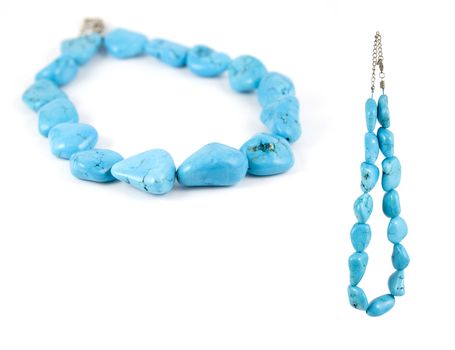 Lovely turquoise necklace isolated on pure white background. Copy-space.