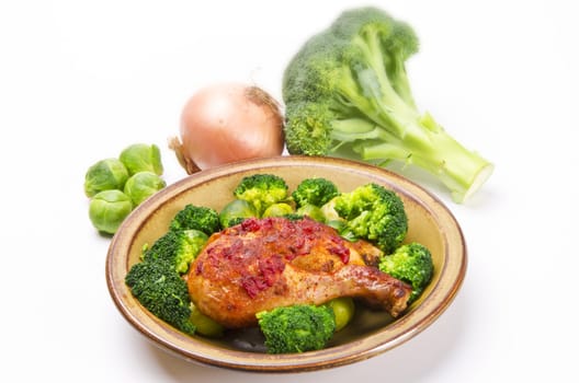 Chicken's thigh in the vegetable