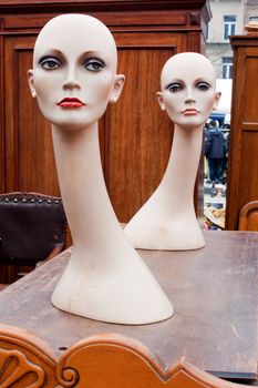 Two dolls on a flea market. They can be used as models.