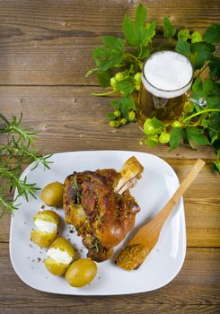 Roasted pork knuckle. Ham and bacon are popular foods in the west, and their consumption has increased with industrialisation.