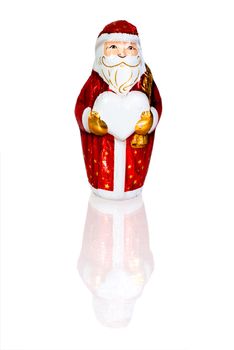 Chocolate Santa Claus figure carrying a hear shape that can be used for your text