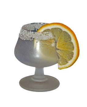 A goblet decorated with sugar crystals and lemon slice isolated on white