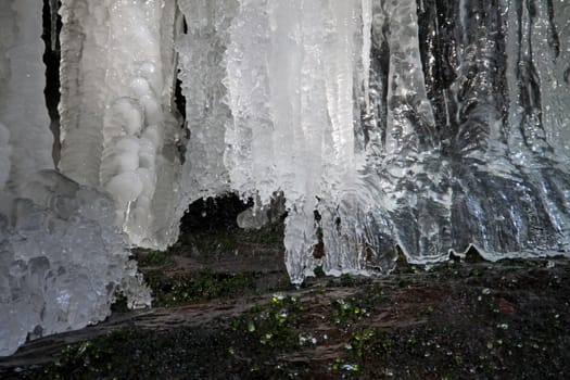 Close up of a winterly frozen waterfall