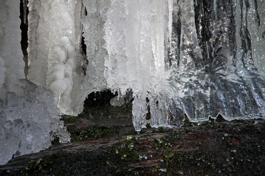 Close up of a winterly frozen waterfall