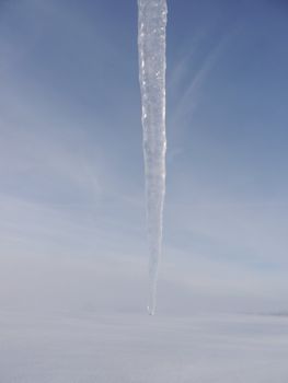 icicles hanging from the roof outside in landscape