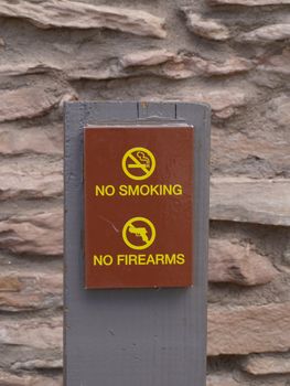 No smoking and no firearms sign