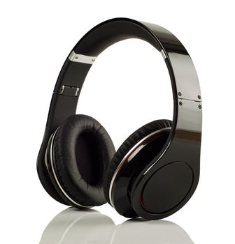 Modern music headphones on white