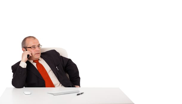 businessman sitting at desk and making phone call with copy space, isolated on white