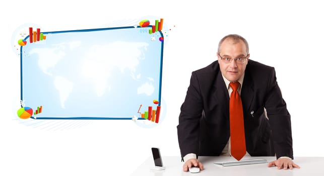 Businessman sitting at desk with copy space, isolated on white