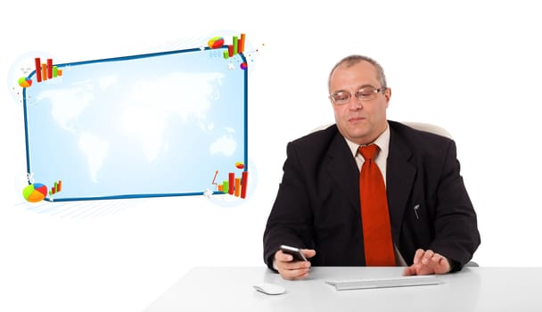 businessman sitting at desk and holding a mobilephone with copy space, isolated on white