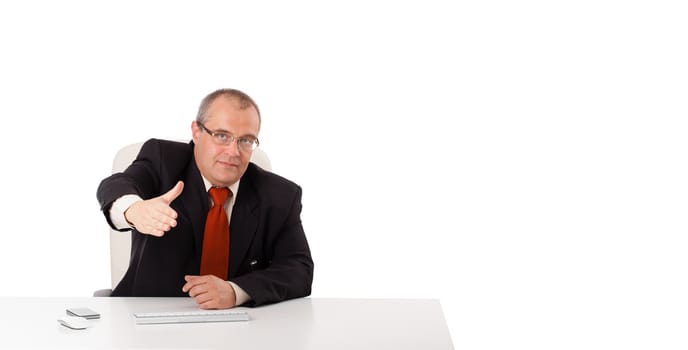 businessman sitting at desk with copy space, isolated on white