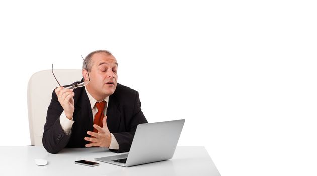 buisnessman sitting at desk and looking laptop with copy space, isolated on white