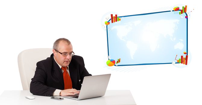 businessman sitting at desk and looking the laptop with copy space, isolated on white