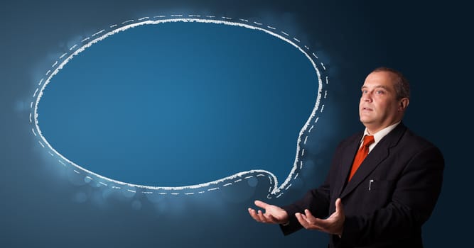 businessman in suit presenting speech bubble copy space