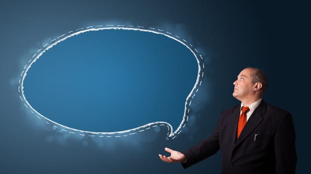 businessman in suit presenting speech bubble copy space