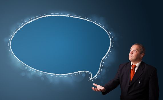 businessman in suit presenting speech bubble copy space