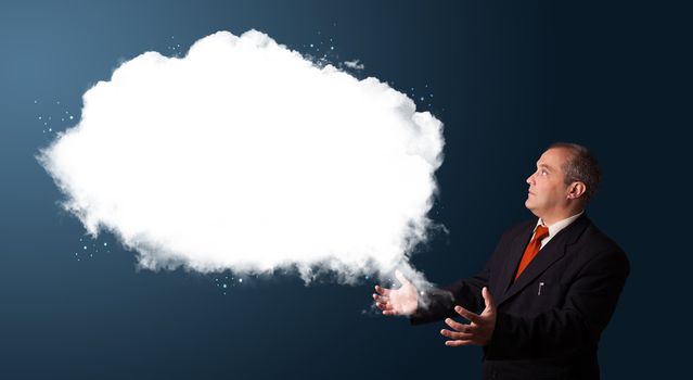 businessman in suit presenting abstract cloud copy space