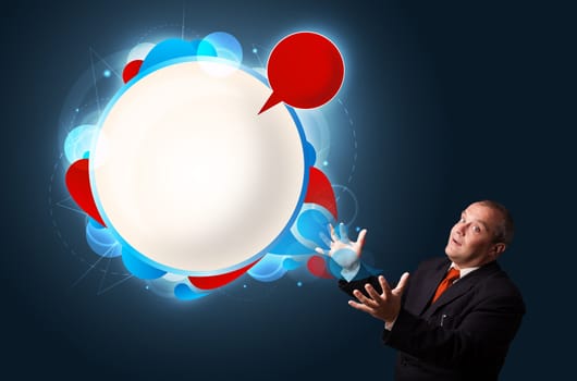 funny businessman in suit presenting abstract modern speech bubble copy space