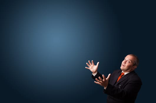 funny businessman in suit gesturing with copy space