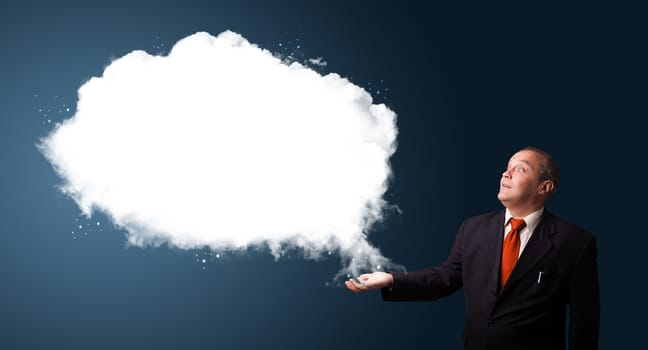 businessman in suit presenting abstract cloud copy space