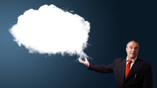 businessman in suit presenting abstract cloud copy space