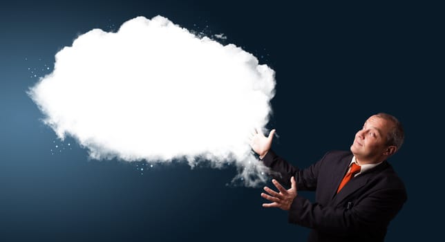 businessman in suit presenting abstract cloud copy space