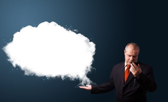 funny businessman in suit holding a phone and presenting abstract cloud copy space