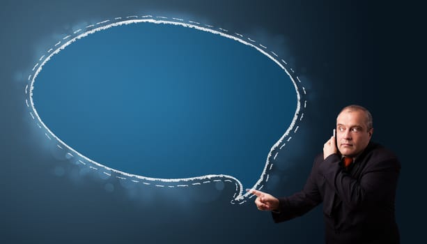 businessman in suit making phone call and presenting speech bubble copy space