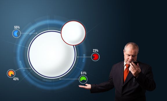 crazy businessman in suit holding a phone and presenting abstract modern pie chart with copy space