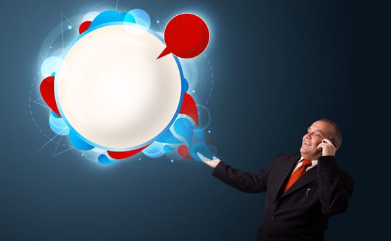 businessman in suit making phone call and presenting abstract modern speech bubble with copy space