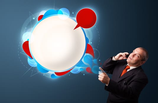 businessman in suit making phone call and presenting abstract modern speech bubble with copy space