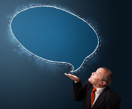 crazy businessman in suit presenting speech bubble copy space