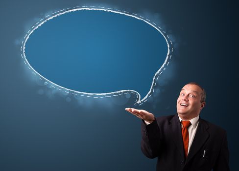 crazy businessman in suit presenting speech bubble copy space