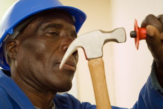 African American Construction Worker with Hammer in Hand
