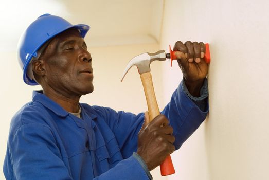 African American Construction Worker, Handyman, Holding Hammer, In Motion