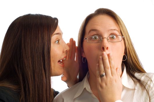 Gossiping businesswomen with amazed, astonished or embarassed expression isolated on white