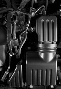 Modern car engine with air filter in black and white