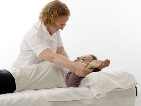 Kinesiologist or physiotherapist treating Trapezius