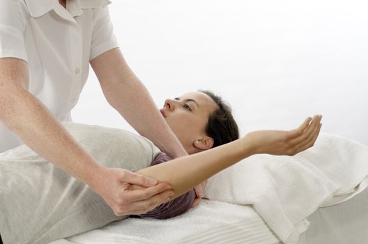 Kinesiologist or physiotherapist treating Rhomboids