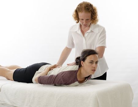Kinesiologist or physiotherapist treating Sacrospinalis