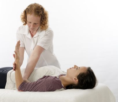 Kinesiologist or physiotherapist treating Triceps