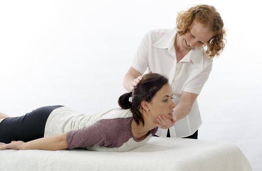 Kinesiologist or physiotherapist treating neck muscles