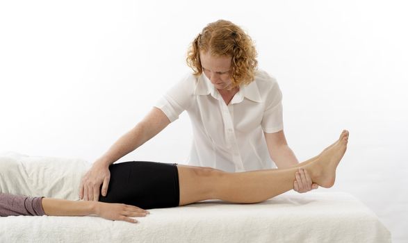 Kinesiologist or physiotherapist treating Adductors