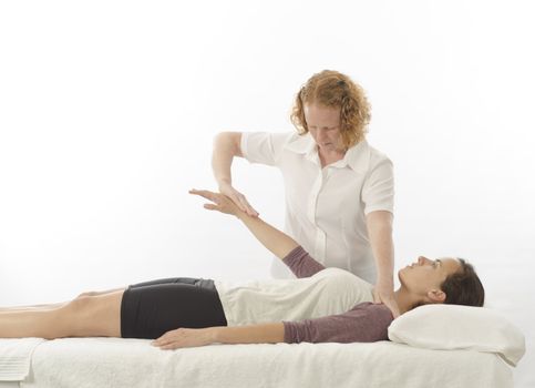 Kinesiologist or physiotherapist treating anterior deltoid