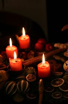 Traditional Christmas wreath and burning candles