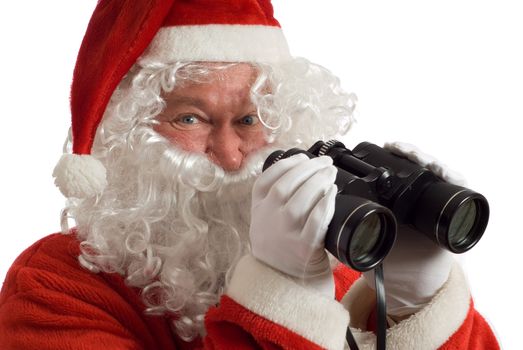 Isolated Father Christmas with a jolly look in his eye and binoculars