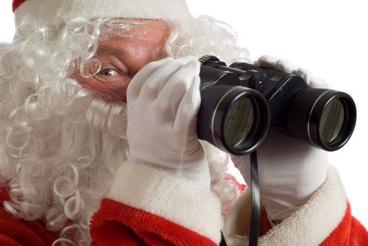 Father Christmas with a jolly look in his eye and binoculars