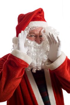 Father Christmas shouting something with hands at side of beard and mouth