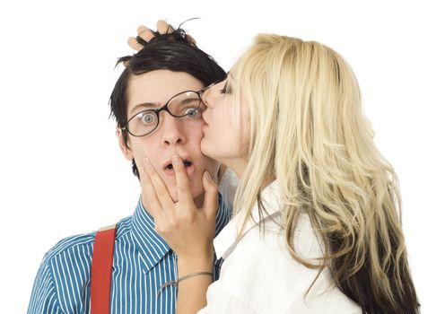 Nerd business man surprised by kiss from pretty valentine girl isolated on white